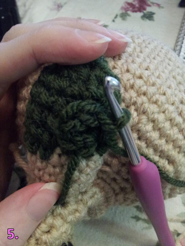 You'll want the color change to happen on the back of the arm. 6-9. 12sc 10. 6dec, stuff. 11. 2dec, f/o close hole. Do the same for the other arm. Thumb: With dark green yarn: 1.