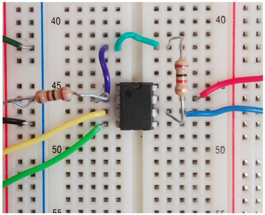 Connect the V_POS (pin 7 of op-amp) to the +25 V supply of the VirtualBench power supply (red wire on breadboard) Connect the V_NEG (pin 4 of op-amp) to the -25 V supply of the VirtualBench power