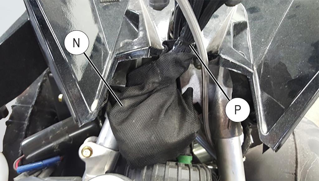 10. Locate the handlebar wire connector protective bag (N).