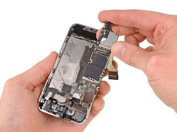 Carefully lift the logic board from the end closest to the speaker enclosure and slide it away from the top edge of the iphone.