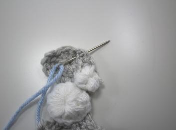 Attach to poodle body with puff side facing up.