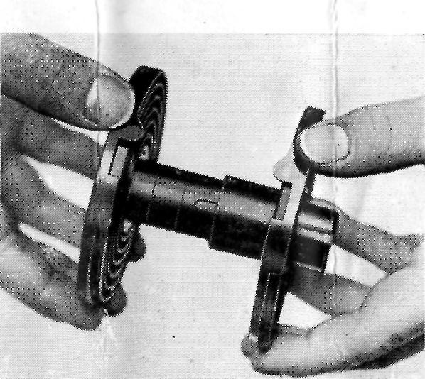 20 No. 27 Leica Film (18 exposures) Fig. 2 Note. When moving the top half of the spiral, hold same as illustrated to avoid uneven strain on the collar.