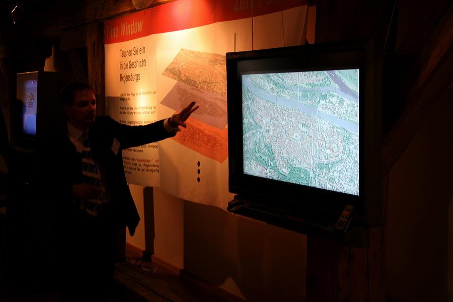 For the preview, TimeWindow used a touch sensitive SMARTboard, as shown to the right. A typical interaction begins with a recent image of Regensburg.