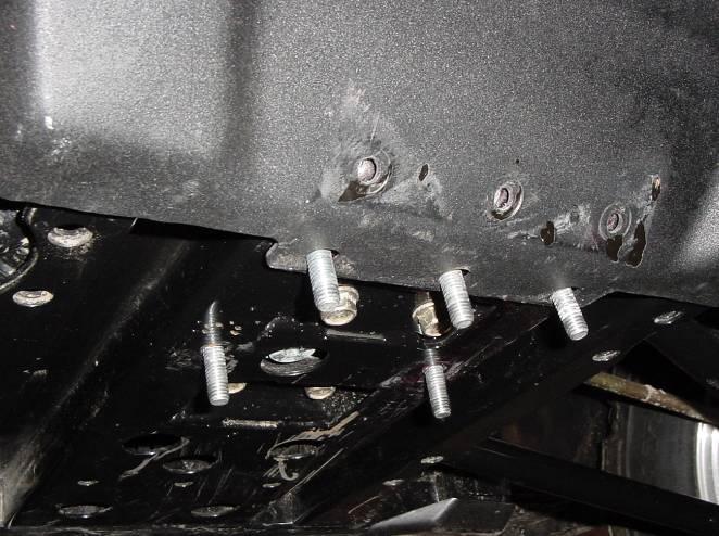 2, install the bolts with washers under the heads down through the main vehicle frame as shown. 1.