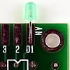 (anode) at 6mm. Then insert the first green LED on the PCB, long leg (anode) on top.