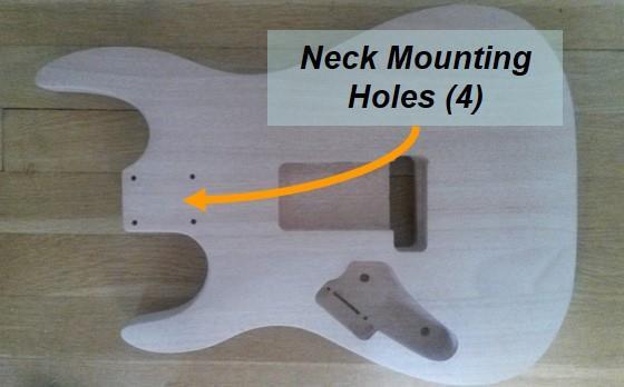 Section 2 Mockup and Fit Check 2 Mockup and Fit Check The following steps will ensure that the base, neck, tuners, pickup, etc. are properly aligned and that all screw holes have been drilled. 2.1 Check the Neck Holes in the Body for Size (Fig.