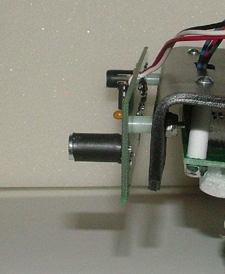 Figure 13. Side view of the proximity detector mounted to the nose of a robot. The cables from the proximity detector PCB plug into a single channel of an input port.