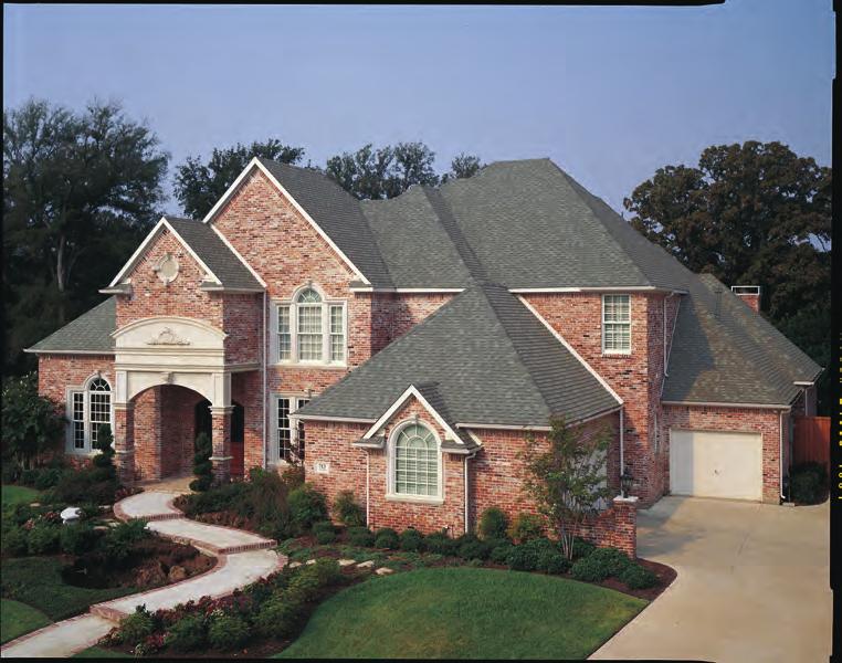 As part of the American Heritage Series of laminated asphalt shingles by TAMKO, Heritage Woodgate shingles