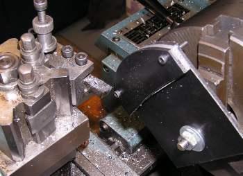 There is a aluminum spacer plate sandwiched between the sector plate and stand to permit turning the inside of the sector pate without marking the stand.