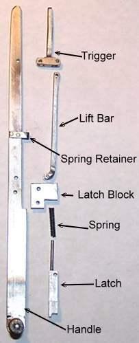 The handle was made from 1/8" X 3/6" CFS bar. It is 6.5" long from the center of the 1/4" axel hole at the bottom to the tip. The spring retainer was cut from 1/8" X 1/4" bar.