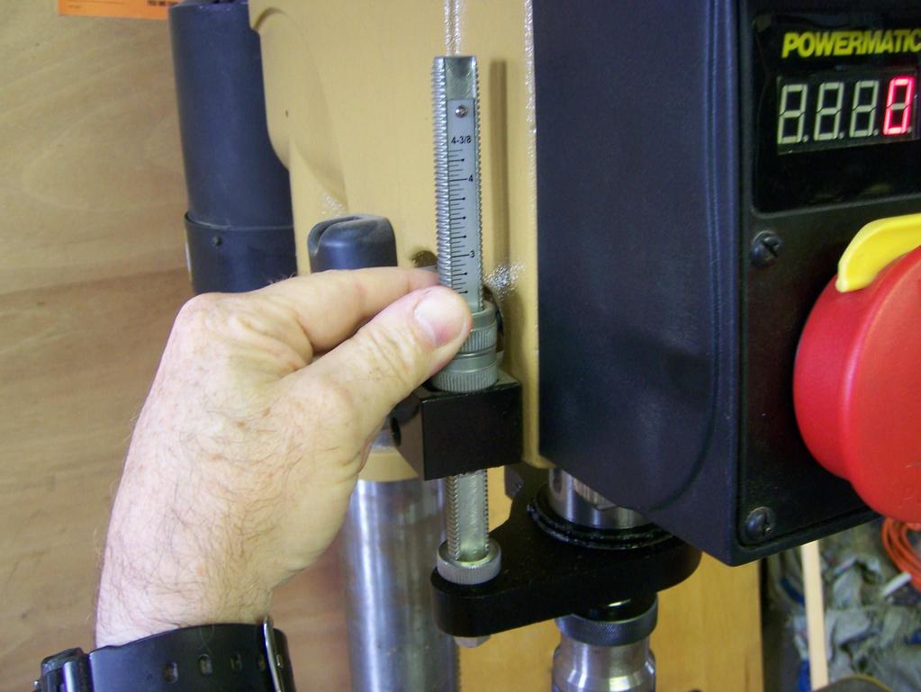 iv. Set up drill press stops for backcheck height. Press the back check into the key to the line you have marked. (See fig.