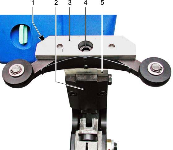 Installing the roller holder 1 Adjusting screw (2x) 2 Stripper 3 Roller holder 4 Screws (M12) 5 Spacer Fig. 54706 1.