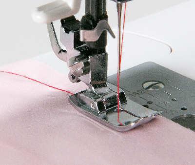 Since the needle drops into a small round opening, the seam is stabilized to create a perfect straight stitch.