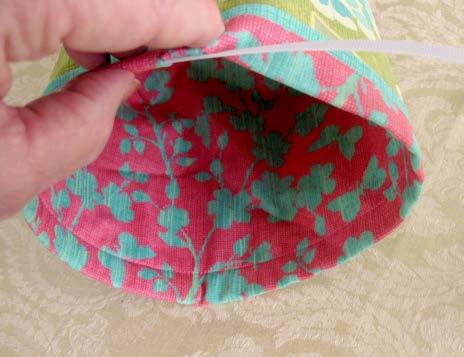 It will slide through nicely for most of the length of the casing but may bind up a bit toward the back seam.