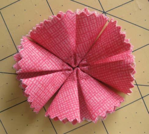 4. Sew your choice of button to the center of the posy.