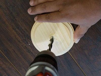 Use a hand-held drill with a 3/8" drill bit to