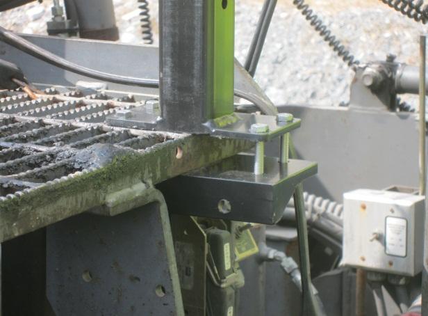 using four to eight bolts and a flat steel plate or mast base. In some cases, installation of the scanner mast base plate required holes to be drilled for the mounting bolts.