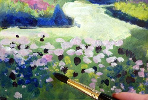 Drag the brush sideways slightly to create oval shaped flowers, place light colours over dark as well as covering some