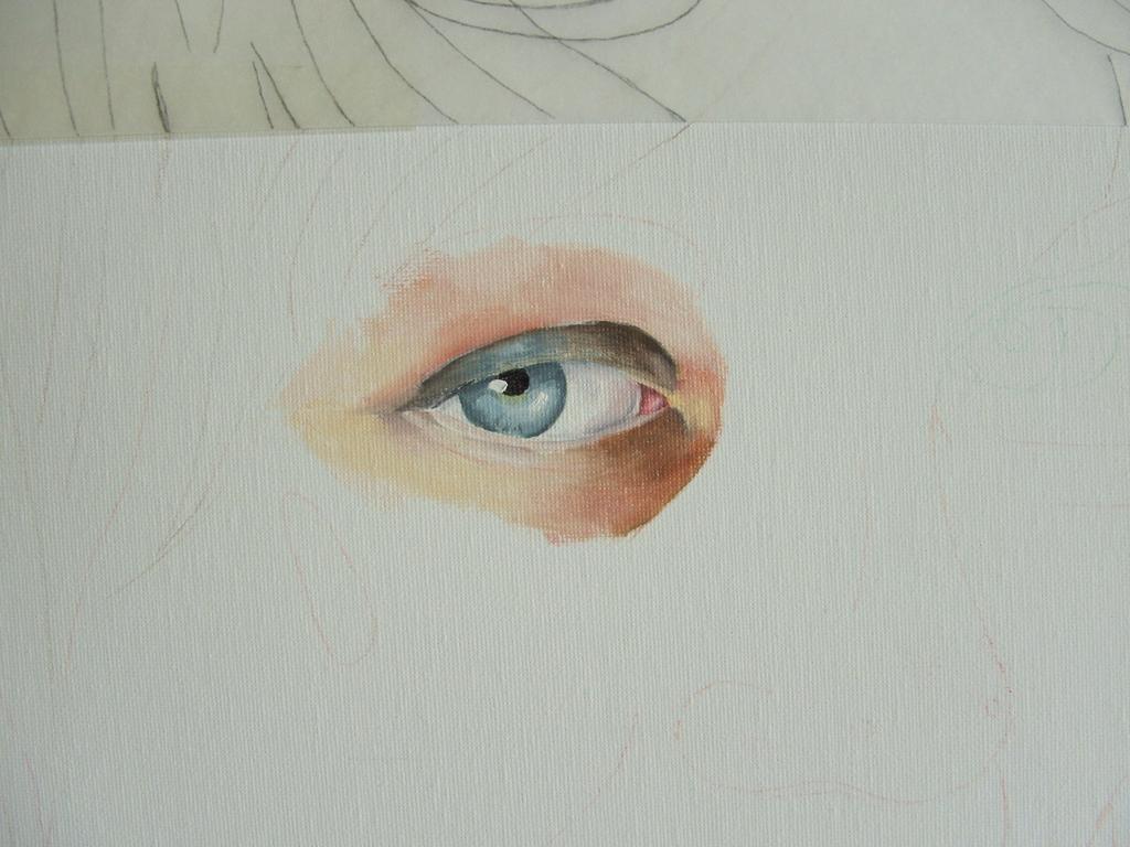 Step 5 Starting with the left eye I paint that in. Every colour I need I find my closest matching colour on the palette and make small impromptu mixes with the brush to match the correct colour.