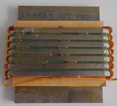 In addition to the characteristic data from Table 2, the wires of both lamination stacks are meandered into the slots in series and fixed by a slot closure.