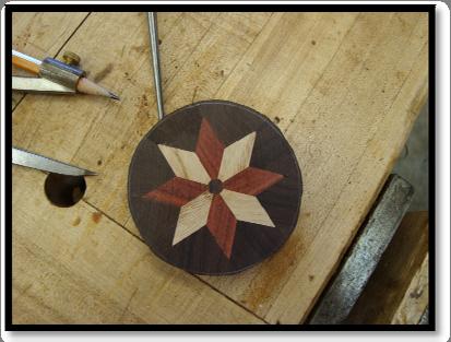 8. Using a compass draw a circle on the glue up. Rough cut on the band saw to create the circle.