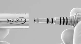 Holding the swivel coupler in straight alignment with the back of the handpiece, insert the swivel coupler into the back of the handpiece, pushing more firmly when fully inserted until the coupler