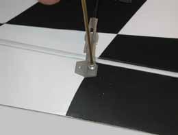 Centre each aileron between the root and tip so that there is an equal gap at both ends.