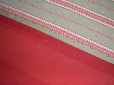 Use a serger or an overcast stitch to finish the raw edges so they