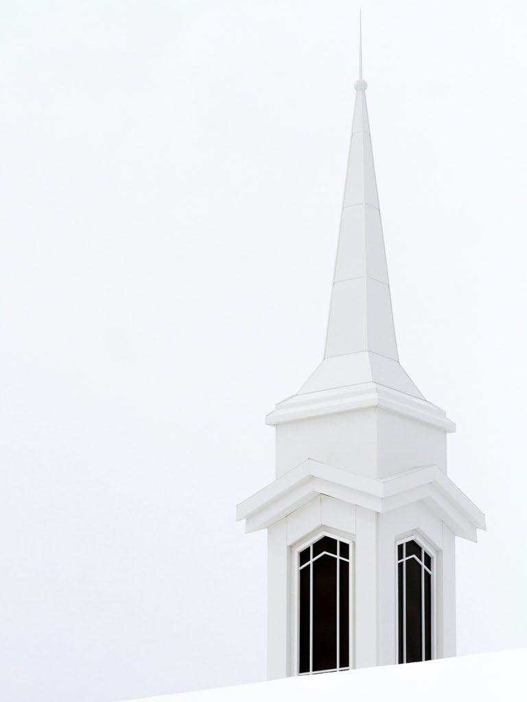 Parting Shot A church steeple creates a stark scene with a bright overcast sky, near Ogden, Utah.