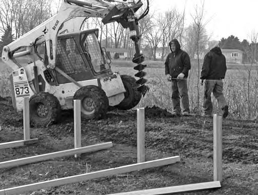 MARK MAIN COLUMN POST LOCATIONS The main column posts are set using the same spacing and methods described in the ground post procedure. The line of main posts runs parallel with the ground posts.