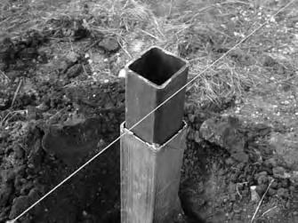 If the posts are not driven into the site, continue with these steps to set lower posts into the holes prepared in the previous procedure: NOTE: If the proper equipment is available, the lower 120"