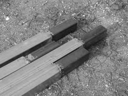 Allow a few inches of the posts to remain above ground level so the posts can be cut and prepared to remove the damaged top edge and to receive the insert.