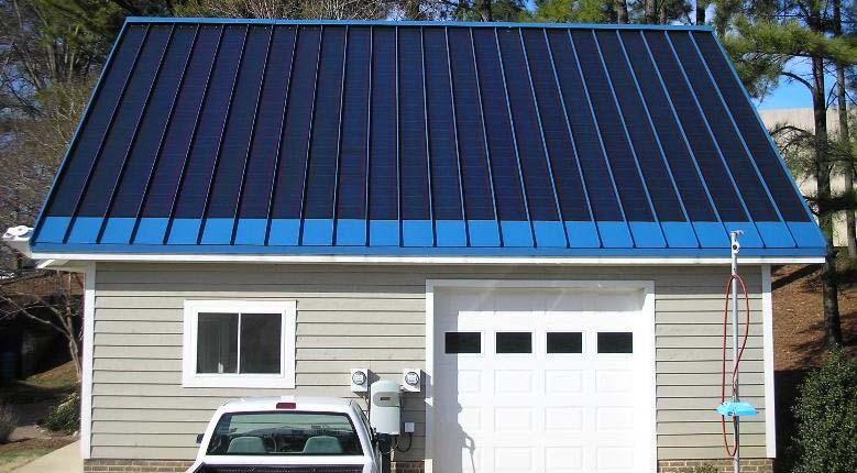 the garage with all 24 panels. The eight PVL-128B panels are on the left or west side of the roof while the sixteen SSR-128J panels are on the right or east side of the garage. Figure 1.