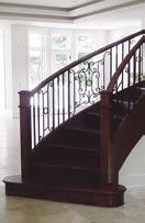 Majestic Featuring oak box-newels mounted on top of a double starting step, this supported, doubleopen stair showcases Custom Iron s Spanish Gate (10620) and Madrid (10622)
