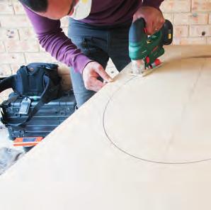Use measurements in Step 22 and a cut-out from first panel to mark position for first ellipse.