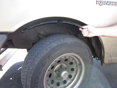 Front Flare Installation Procedures (Driver s Side): Remove factory fl are, mud fl ap, or