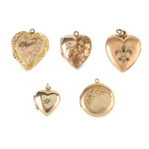 Lot 167 Five lockets Five lockets. To include a circular locket and four heart-shaped lockets, one set with a blue glass cabochon, another set with colourless pastes in a fleur-de-lis outline.