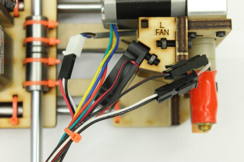 Auto leveling probe connection 2.) Connect the fan and extruder wiring. a. Hot end power cable to hot end power lead (red and black cables) b.