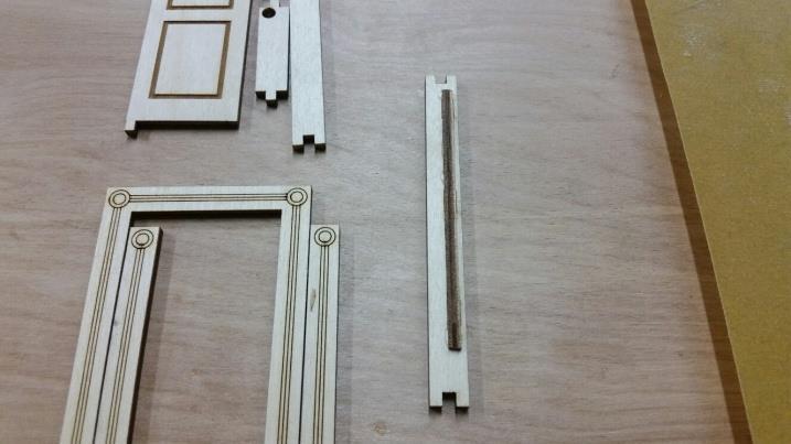 ) 1-Door stop 1-outer frame rail with holes for door stop 1-interior frame rail 1-upper and 1 lower cross