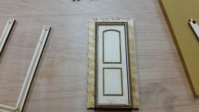 Next install door into the hole on half assembly completed earlier. Figure 4 Step 5.