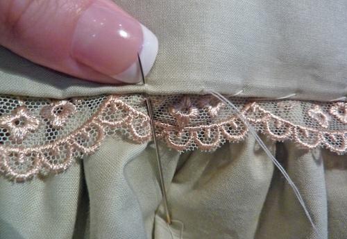 This lace was a bit wider than our bib lace; we inserted the lace ¼" under the fold with a ½" reveal below the fold. 7.