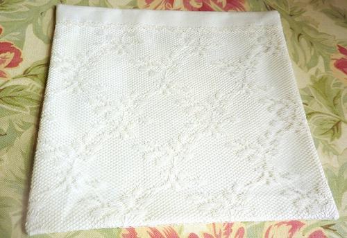 Topstitch across the top of the lace to secure it to the fabric.