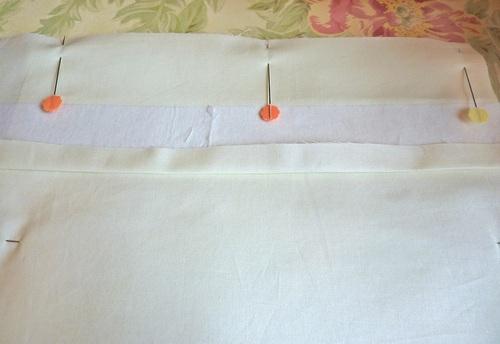 Following manufacturer's instructions, fuse the interfacing rectangle to the wrong side of one of the fabric rectangles. 3.