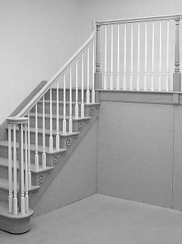 Open sides of stairs with a total rise of more than 30 inches (762 mm) above the floor or grade below shall have guards not less than 34 inches (864 mm) in height measured