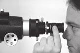 ) Place the parfocal ring on the eyepiece s barrel and slide it all the way up. Tighten the thumbscrew on the ring. (11c.