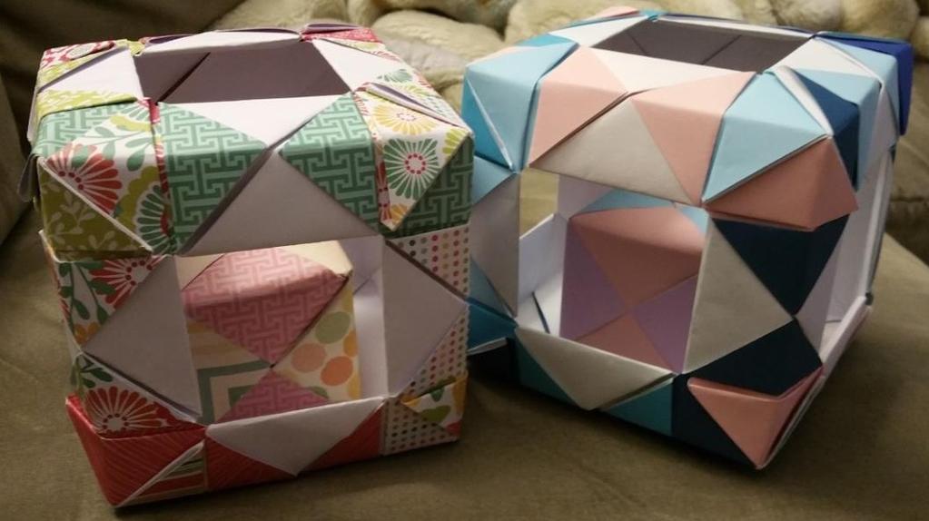 The Origami of a Tiny Cube in a Big Cube Emily Gi