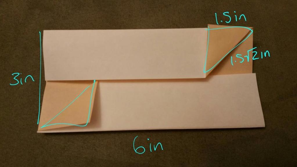 Gi 3 Figure 4. Step 4 Now, take the corner of each flap and fold them up until the side of the width is lined up against the top of the paper.