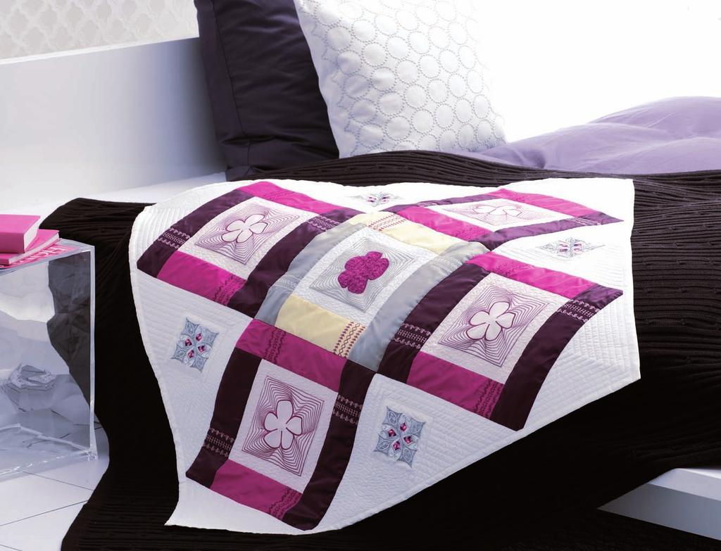 Embroidery turns your quilt into something special.