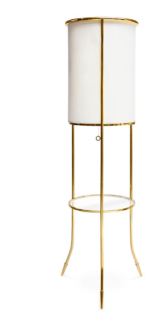 MAXIME FLOOR LAMP Polished brass framework with a white, rolled-linen drum shade, signature arrow sabots, and a tempered glass tabletop 21.5 Dia., 62.