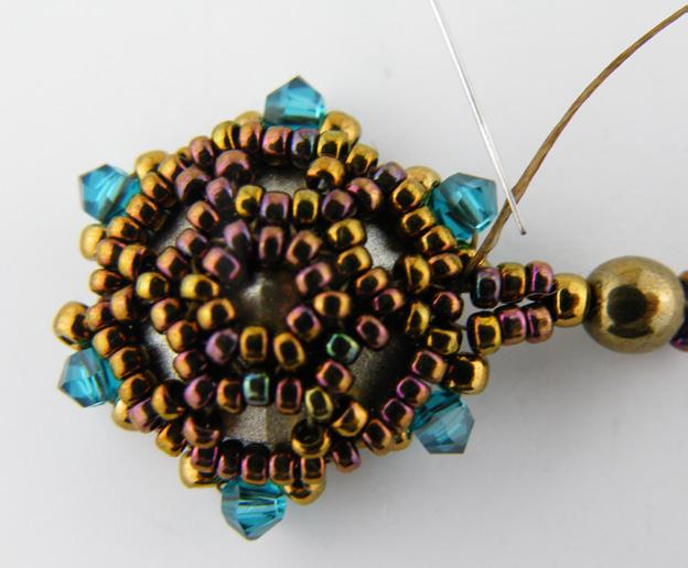 (it can be an accent color) and pass through the next size 11 bead and the next 3mm crystal.